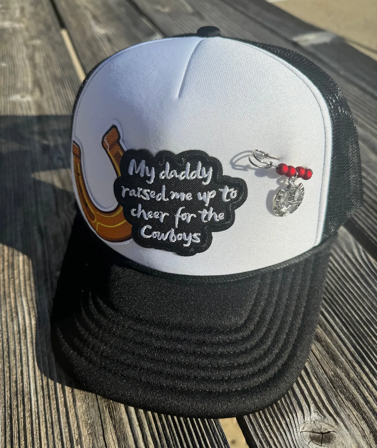 My Daddy Raised Me Up To Cheer On The Cowboys Trucker Hat