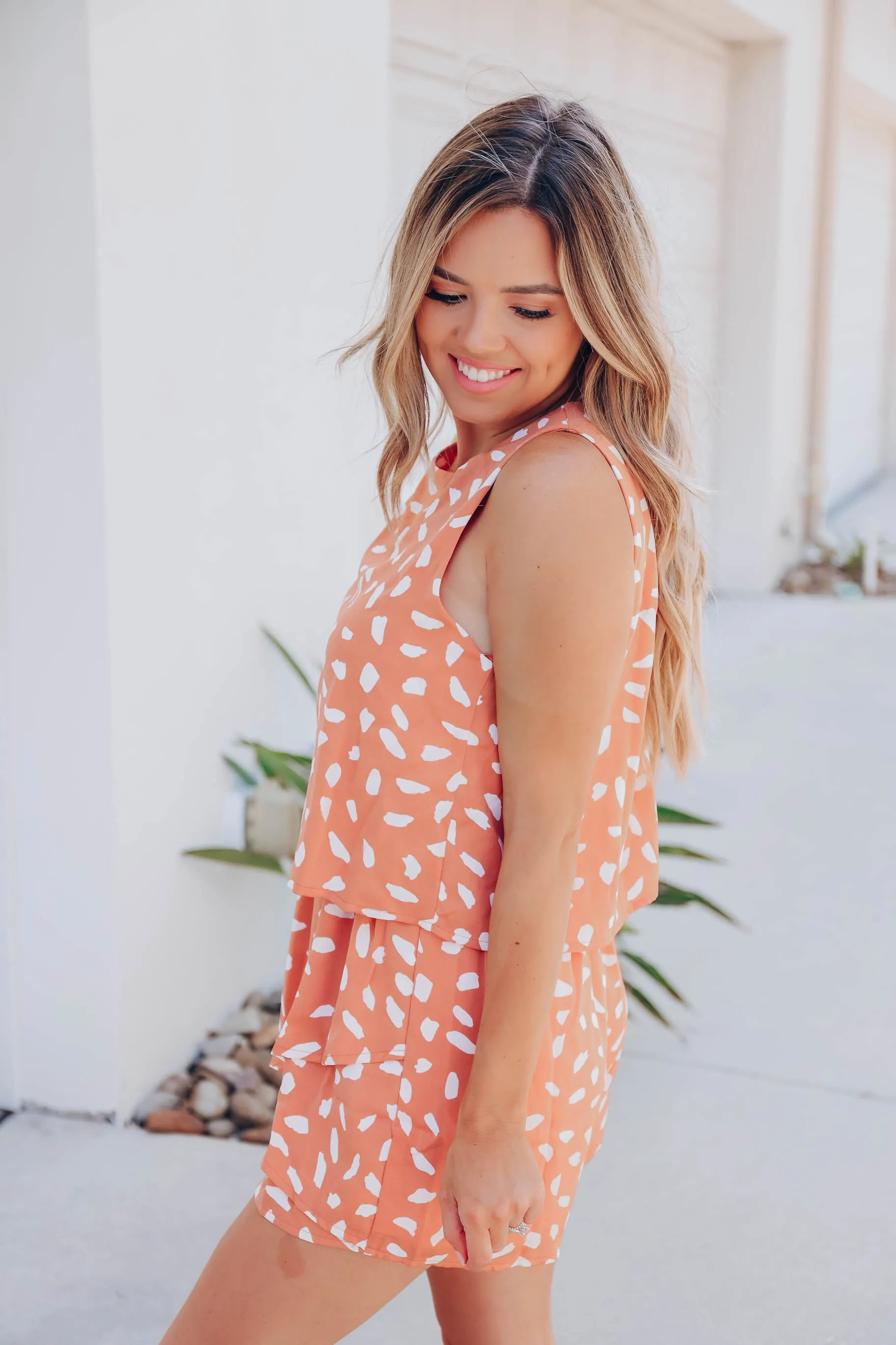 Peach Flounce Dalmatian Dot Romper