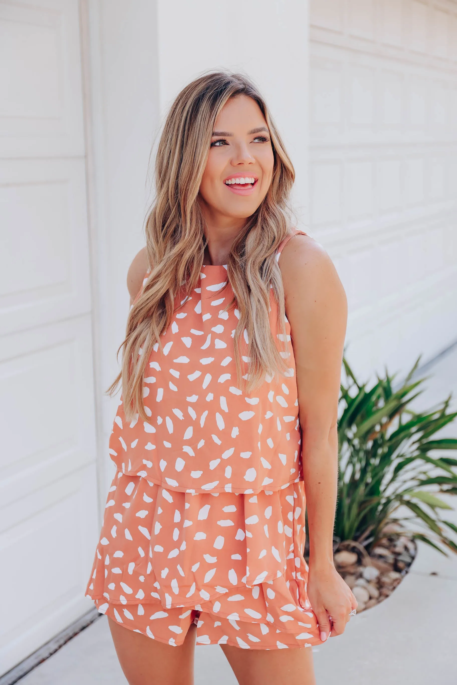 Peach Flounce Dalmatian Dot Romper