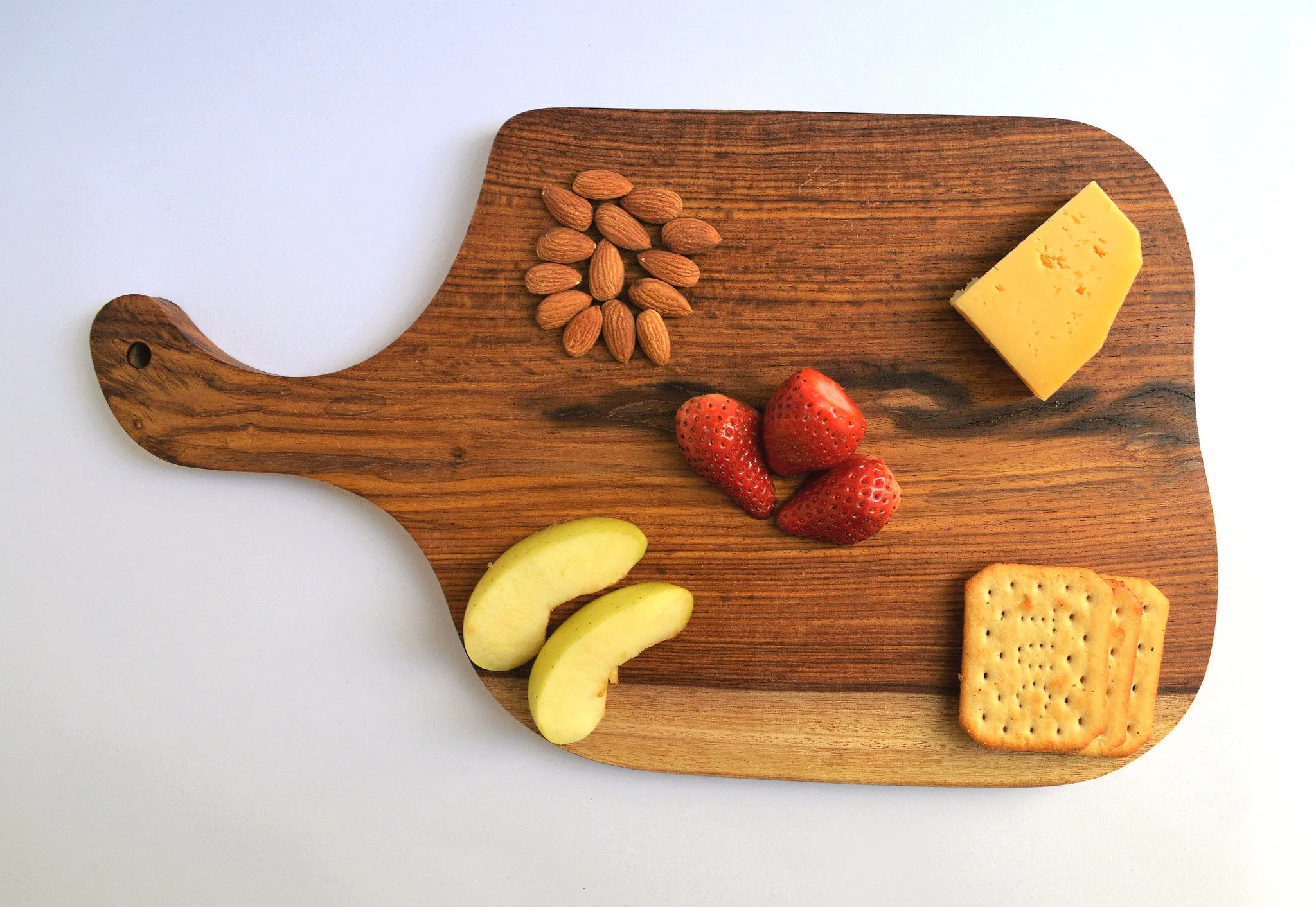 Rustic rosewood cutting board, organic shape, cut of one piece of wood